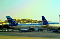 HZ-AS13 @ OERK - SVA parked at Riyadh airport next to it is the Spanish Rented B744 with the SVA logo on it - by Odai Ayyad
