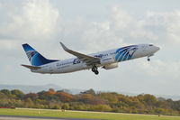 SU-GEC @ EGCC - Egyptair Boeing 737-866 taking off from Manchester Airport. - by David Burrell