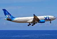 F-GSEU @ FMEE - Final for runway 12 - by Mickael Payet