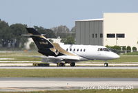 N116JG @ KSRQ - Raytheon Hawker 800XP (N116JG) arrives at Sarasota-Bradenton International Airport - by Donten Photography