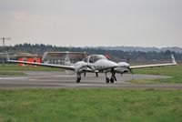 G-DOSA @ EGHH - Taxiing to depart 08 - by John Coates