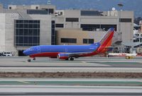 N642WN @ KLAX - Boeing 737-300 - by Mark Pasqualino