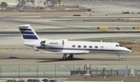 N104AD @ KLAX - Taxiing to parking at LAX - by Todd Royer