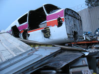 N888NV - This airplane is scrap in the yard at Apex Electronics in Sunland Electronics - by Chris Stephens
