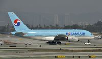 HL7612 @ KLAX - Taxiing to gate at LAX - by Todd Royer