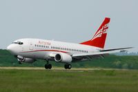 4L-TGI @ LFPG - Boeing 737-505, Landing Rwy 26L, Roissy Charles De Gaulle Airport (LFPG-CDG) - by Yves-Q
