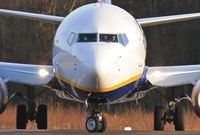 EI-DHJ @ EGHH - Cheery wave whilst lining up. - by John Coates