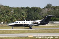 N800GV @ KSRQ - Beechcraft Beechjet (N800GV) departs Sarasota-Bradenton International Airport enroute to Cleveland-Hopkins Airport - by Donten Photography