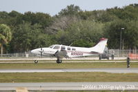 N996KR @ KSRQ - Beechcraft Baron (N996KR) arrives at Sarasota-Bradenton International Airport following a flight from Joliet Regional Airport - by Donten Photography