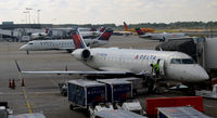 N883AS @ KATL - Being serviced at the gate Atlanta - by Ronald Barker