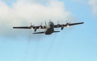 XV291 @ EGFH - RAF Hercules C.1 from the Lyneham Transport Wing beats up the tower at Swansea Airport. Date estimated as the mid 1990's. - by Roger Winser