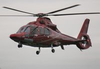 G-WINV @ EGHH - Arriving at Signatures on a very murky day - by John Coates