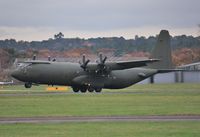 ZH879 @ EGHH - Departing through the murk - by John Coates
