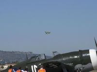 N57BC @ CMA - 2001 Aviat PITTS S-2C, Lycoming AEIO-540, on final Rwy 26 over the P-47G THUNDERBOLT - by Doug Robertson