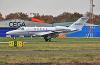 N129CJ @ EGHH - Touching down on 26 - by John Coates