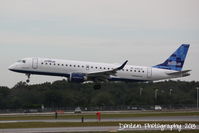 N283JB @ KSRQ - JetBlue Flight 741 (N283JB) Pretty in Pink  arrives at Sarasota-Bradenton International Airport following a flight from Boston-Logan International Airport - by Donten Photography