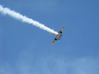 N1038A @ CMA - 1944 North American SNJ-5 'WAR DOG', P&W R-1340 Wasp 600 Hp, low level airshow with smoke - by Doug Robertson