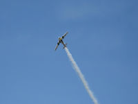 N1038A @ CMA - 1944 North American SNJ-5 'WAR DOG', P&W R-1340 Wasp 600 Hp, low level airshow with smoke - by Doug Robertson
