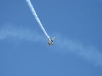 N1038A @ CMA - 1944 North American SNJ-5 'WAR DOG', P&W R-1340 Wasp 600 Hp, low level airshow with smoke - by Doug Robertson
