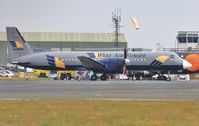SE-KXP @ EGHH - Resting on the cargo apron. - by John Coates