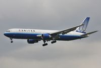 N659UA @ EGLL - Finals to 27L - by John Coates