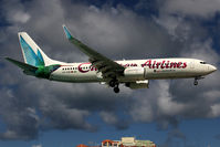 9Y-KIN @ SXM - At famous Maho Beach - by Wolfgang Zilske