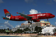 N615JB @ SXM - At famous Maho Beach - by Wolfgang Zilske