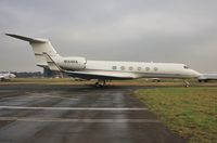 N144KK @ EGHH - Taxiing to depart. - by John Coates