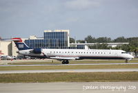 N923FJ @ KSRQ - US Air Flight 2675 operated by Mesa (N923FJ) arrives at Sarasota-Bradenton International Airport following  flight from Charlotte-Douglas International Airport - by Donten Photography