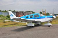 PH-KAX @ EGHH - Parked at BHL - by John Coates