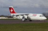 HB-IXT @ EGSH - Departing after spray by Air Livery...