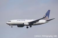 N14704 @ KSRQ - United Flight 1190 (N14704) on approach to Sarasota-Bradenton International following a flight from Chicago-O'Hare International Airport - by Donten Photography