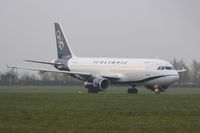 SX-OAM @ EGHH - Misty arrival for repaint - by John Coates
