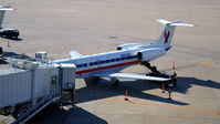 N667GB @ KDFW - Unloading baggage Gate B10B DFW - by Ronald Barker
