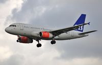 OY-KBR @ EGLL - On approach to 27L - by John Coates