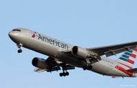 N393AN @ KJFK - Going To A Landing on 31R, JFK - by Gintaras B.
