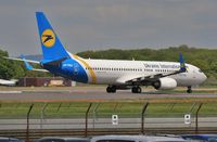 UR-PSC @ EGKK - Departing 08R - by John Coates
