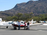 ZU-XML @ SZP - 2009 SA Ravin Aircraft CC RAVIN 500, Lycoming IO-540 260 Hp, retractable gear, composite construction, similar in concept to PA-24 COMANCHE, on Troll Air Round the World Flight, pilot Calle Hedberg with admirers - by Doug Robertson