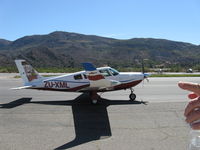ZU-XML @ SZP - 2009 SA Ravin Aircraft CC RAVIN 500, Lycoming IO-540 260 Hp, on Troll Air Round the World Flight, 160 gal. integral wing tanks+ferry tank, a production composite aircraft also available as a kit, taxi back - by Doug Robertson