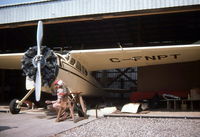 C-FNPT @ CYNJ - Doing some maintenance in Langley, BC in 1987. - by Murray Lundberg
