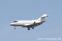 N9867 @ KSRQ - Raytheon Hawker 800 (N9867) on approach to Sarasota-Bradenton International Airport - by Donten Photography