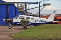 G-JADJ @ EGHH - Just repainted - by John Coates