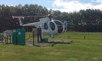 ZK-HMG @ NZAR - Ear muffs and hose - by magnaman
