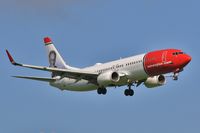 LN-DYY @ EGKK - On approach to 08R - by John Coates