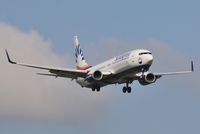 TC-SNH @ EGKK - On approach to 08R - by John Coates