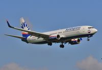 TC-SNH @ EGKK - On approach to 08R - by John Coates