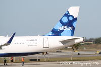 N828JB @ KSRQ - JetBlue Flight 164 (N828JB) Simon Says Fly JetBlue prepares for flight at Sarasota-Bradenton International Airport - by Donten Photography
