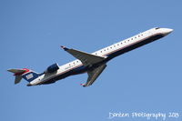 N909FJ @ KSRQ - US Air Flight 2709 operated by Mesa (N909FJ) departs Sarasota-Bradenton International Airport enroute to Charlotte-Douglas International Airport - by Donten Photography