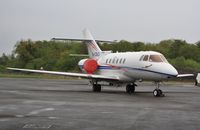 G-CDLT @ EGHH - Parked at JETS - by John Coates