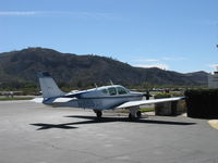 N8557M @ SZP - 1963 Beech 35-B33 DEBONAIR, Continental IO-470-K 225 Hp, refueling - by Doug Robertson